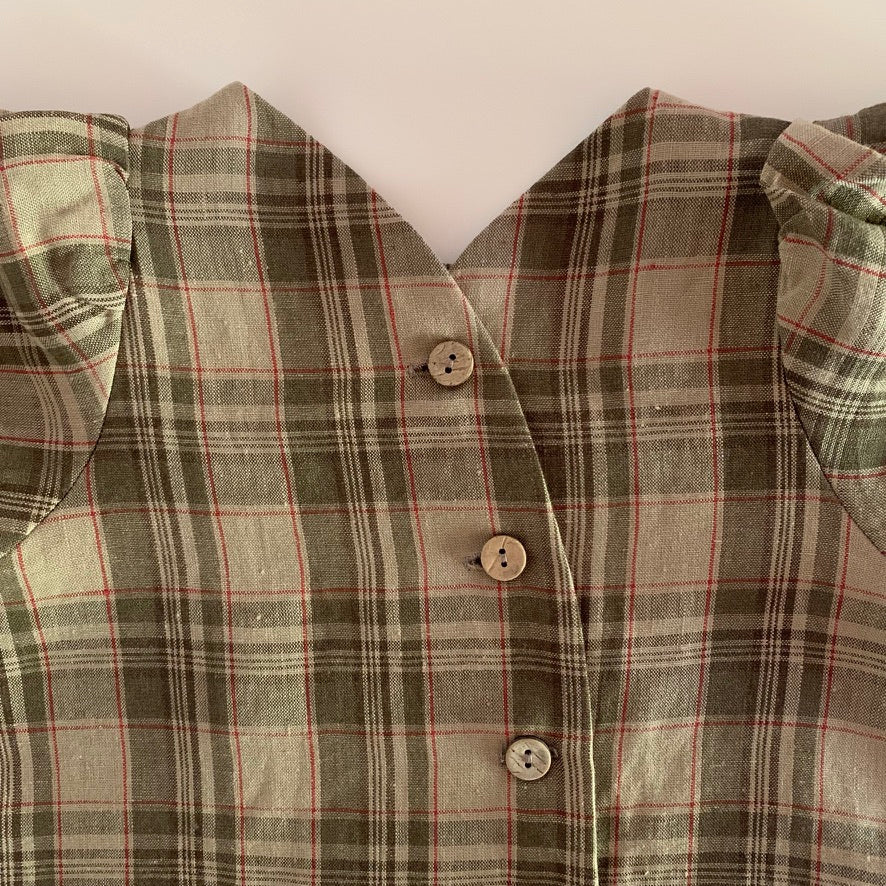 beige/red check shirt